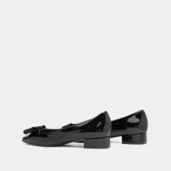 Ballerines avec noeud et monogramme