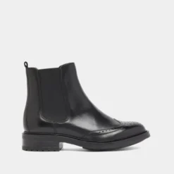Boots basses à élastiques et détails ajourés
