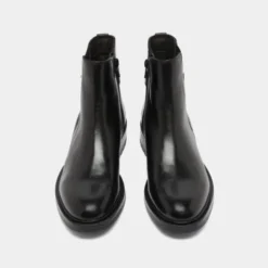 Boots basses à talons crantés
