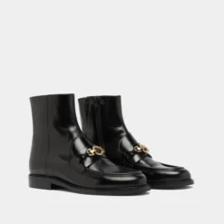 Boots à mors dorés