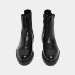 Boots à semelles crantées et élastiques