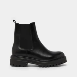 Boots à semelles crantées et élastiques