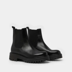 Boots à semelles crantées et élastiques