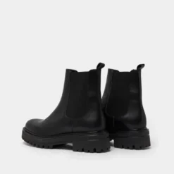 Boots à semelles crantées et élastiques