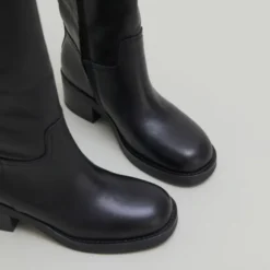 Bottes hautes à boucles