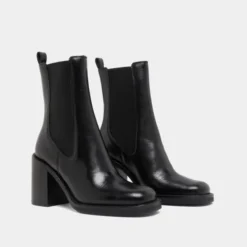 Bottines à talons débordants