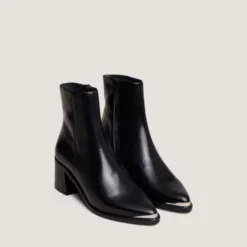 Bottines à talons et embouts argentés