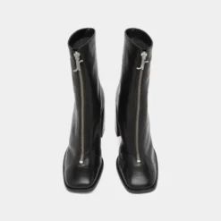 Bottines à talons et fermetures éclairs ...
