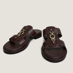 Mules à mors dorés