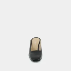Mules à talon incliné