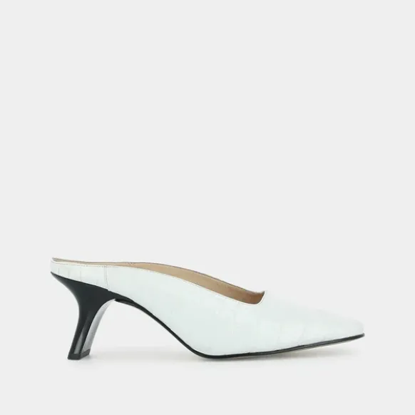 Mules à talons inclinés